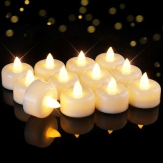 Battery-operated tealight candles with glowing lights on a dark background.