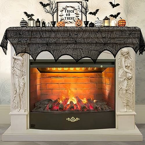 Halloween-decorated fireplace with pumpkins and bats