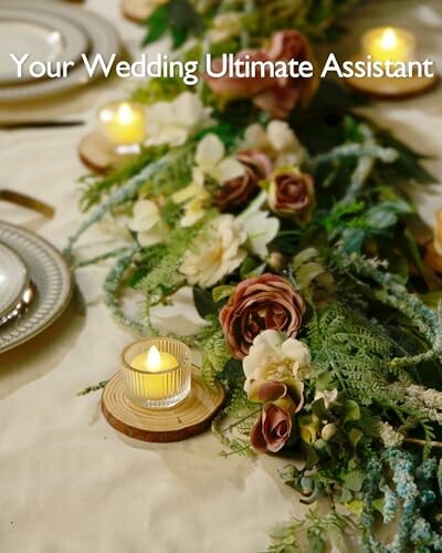 Elegant wedding table centerpiece with flowers and candles.